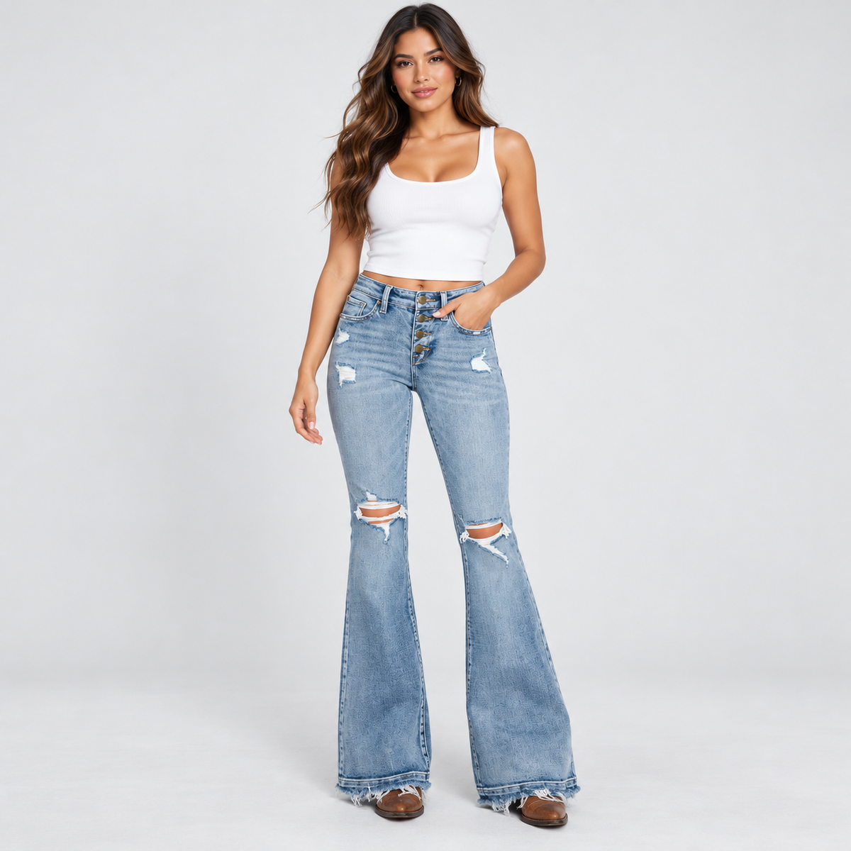 MID RISE STRETCH FLARE JEANWITH FRAYED TROUSER HEM